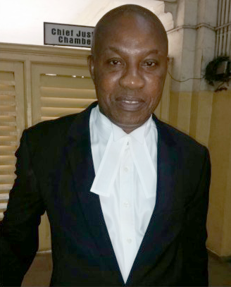 Barrister Tamba Kellie partner at Garber&Co.